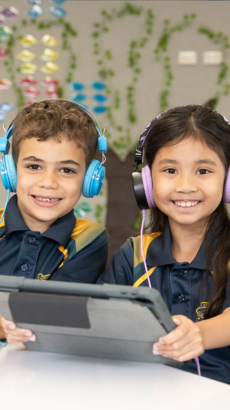St Pat's Guildford students using iPads and headphones