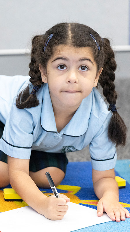 Student in class at St Patrick's Primary School Guildford