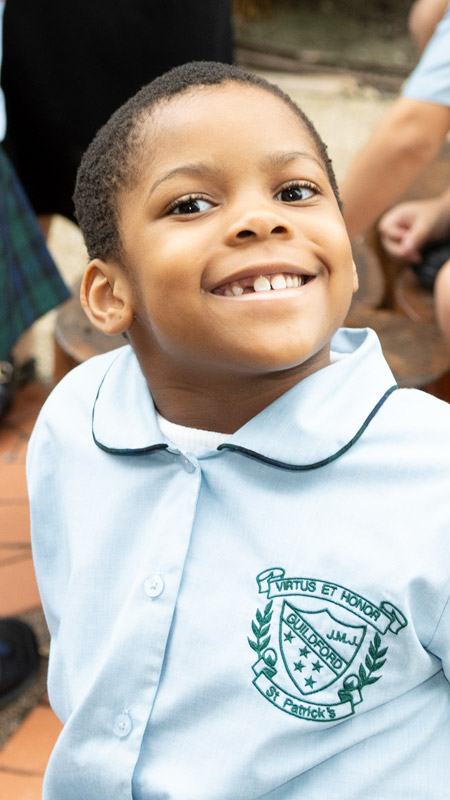 Happy student at St Patrick's Catholic Primary Guildford