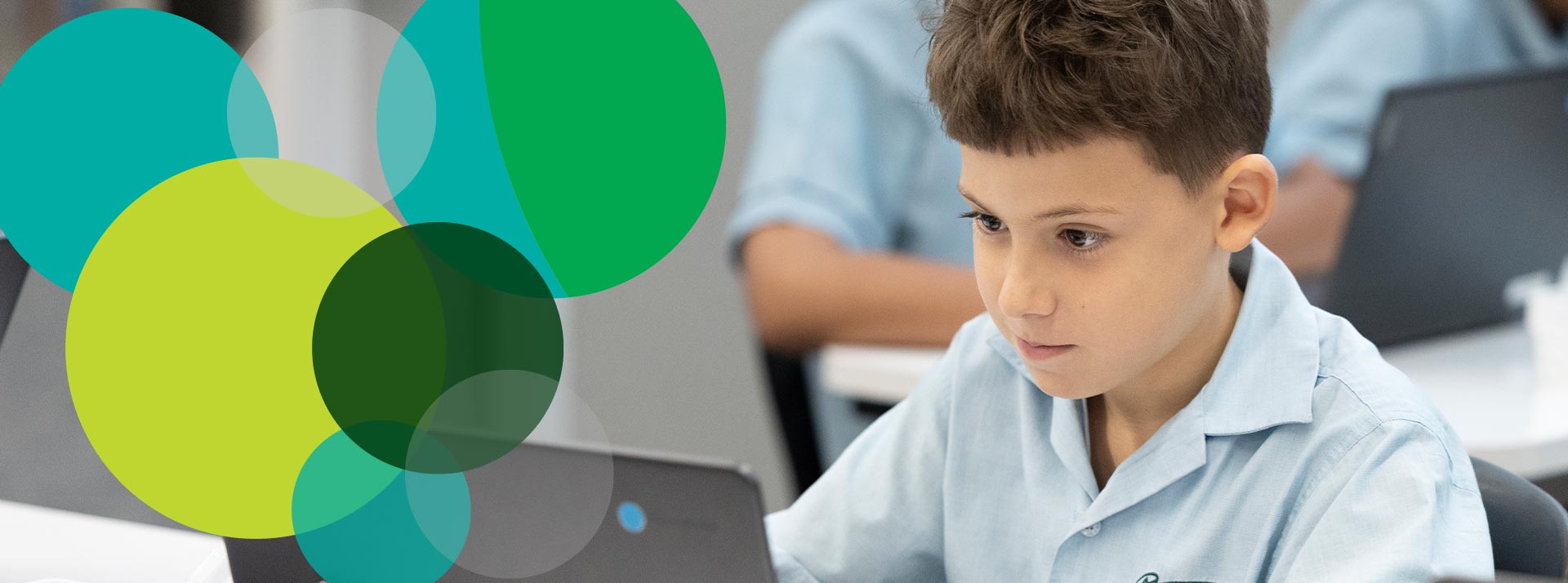 St Patrick's Primary Guildford student using laptop