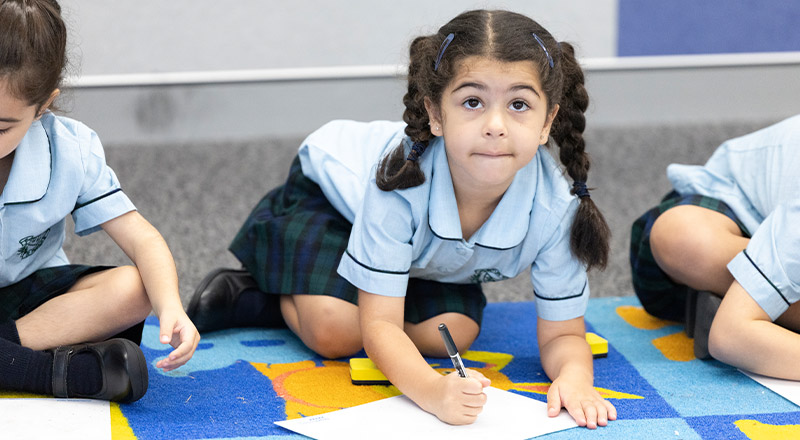 Student in class at St Patrick's Primary School Guildford