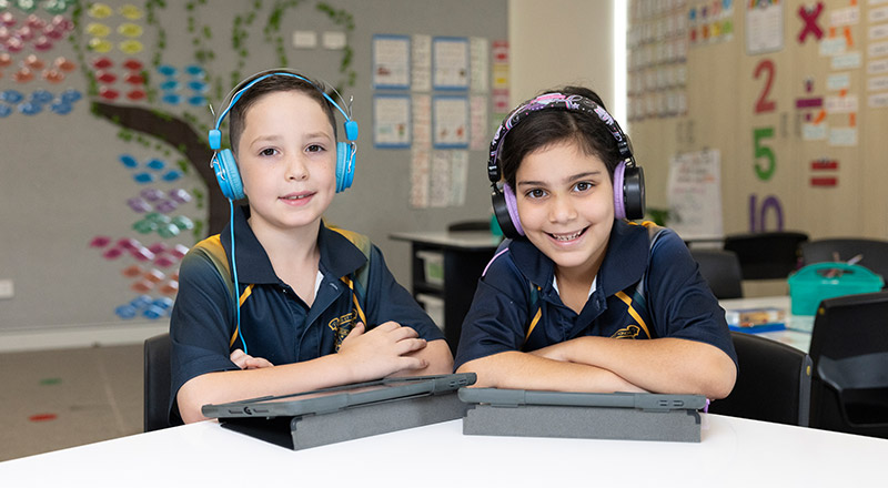 St Patrick's Primary Guildford Students using iPads and Headphones