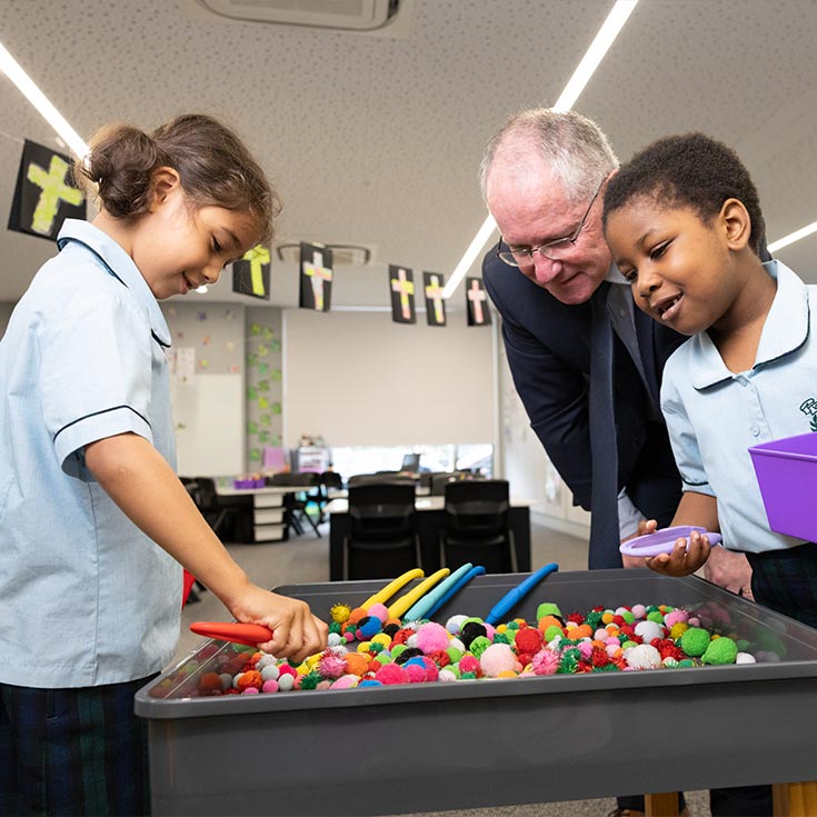 St Patrick's Primary Principal, Steven Jones, and students