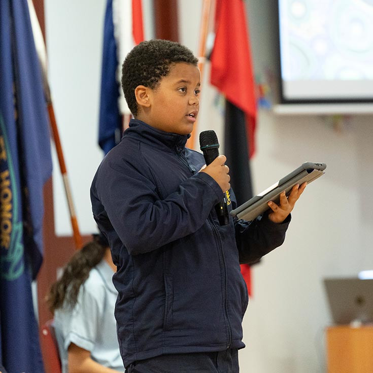 St Patrick's Primary student presenting at assembly